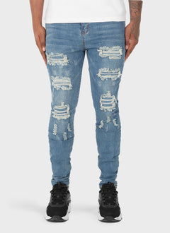 Ripped & Repaired Jeans - Light Blue