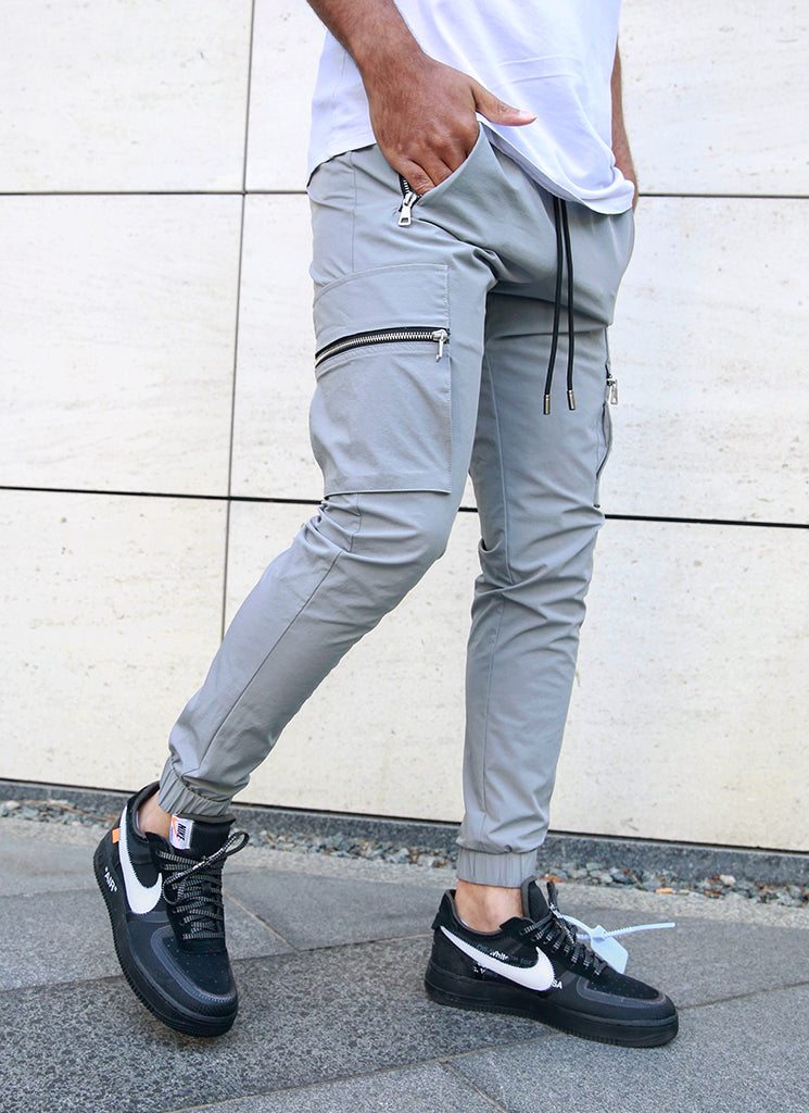 Jogging pants best sale with zipper legs